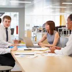 office workers around table