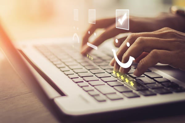 person typing on a computer