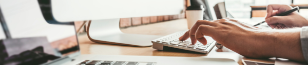 person typing on a keyboard
